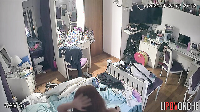 After locking herself in her room, the pretty girl stripped down to her panties