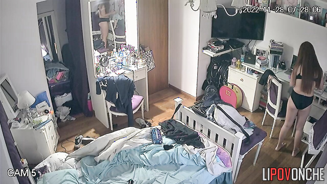 After locking herself in her room, the pretty girl stripped down to her panties