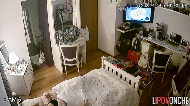 A young girl has a passionate orgasm while intently watching porn on her phone