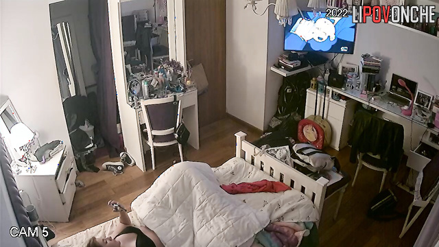 After her orgasm, the redhead licks her wet fingers and pulls up her panties