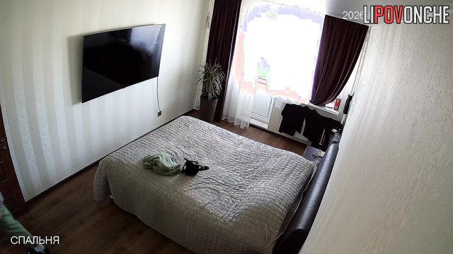 A hidden camera in the bedroom captured the chubby milf's ample breasts