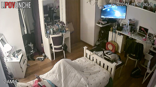 A young beauty got distracted from the movie to watch porn and masturbate