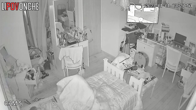 A young redheaded takes off her panties and shines phone's light on wet pussy