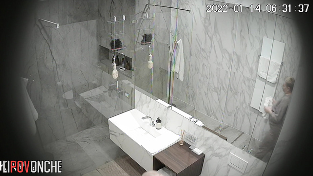 Chubby naked milf taking a shower with a hidden camera