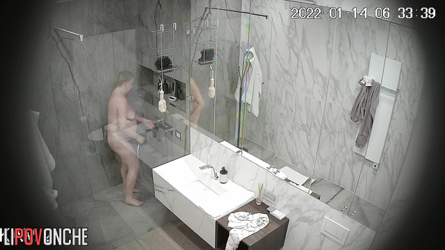Chubby naked milf taking a shower with a hidden camera