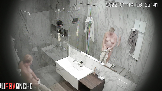 Chubby naked milf taking a shower with a hidden camera