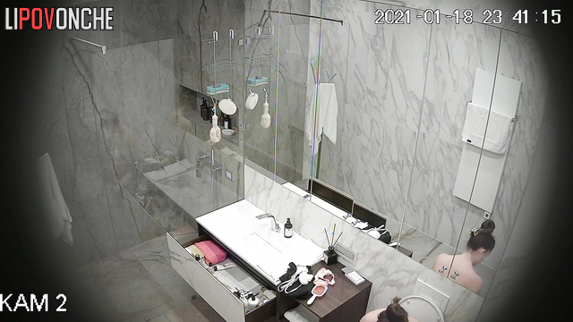 When she takes a shower she sings, bathroom camera