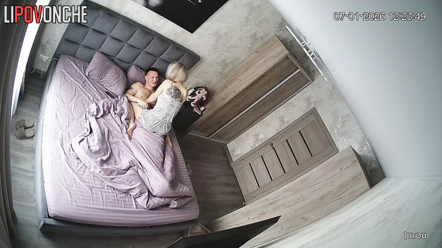 They hug tenderly in bed after reconciling (boyfriend and girlfriend)