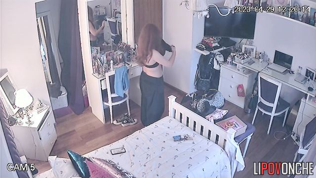 Sexy ginger girl tries to pick the best angle to make a hot nude selfie