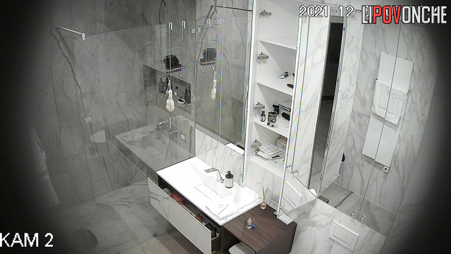 You are invited to join this beautiful girl washing in the bathroom