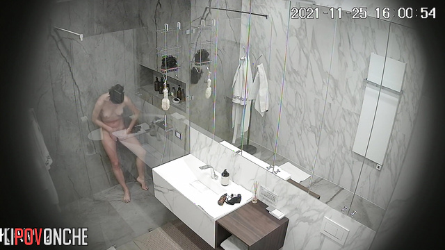 A naked sports beauty with a gorgeous, sexy body is getting ready to take a shower