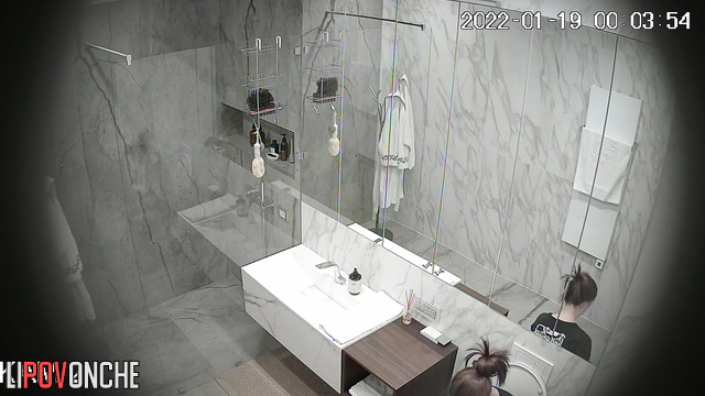 A skinny beauty gently shaves her soft, hairy pussy in the shower