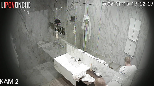 After using the restroom, a fat milf with a big butt takes a shower