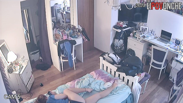 A red-haired beauty sniffs a used panty liner while wearing her panties down