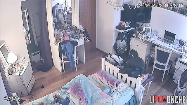A red-haired beauty sniffs a used panty liner while wearing her panties down