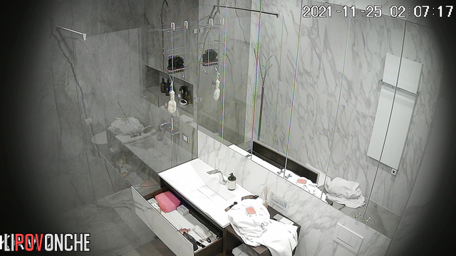 Sporty girl eagerly directs the shower stream at her hairy pussy