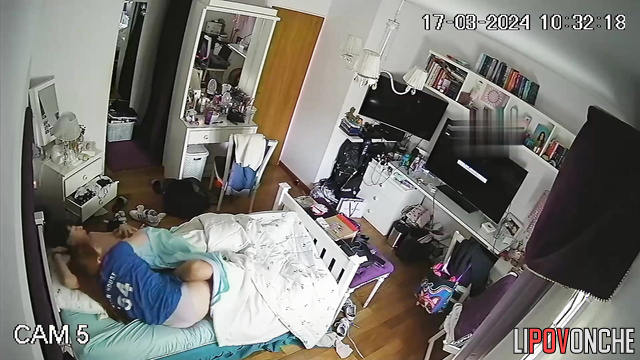 The red-haired girl presses her sexy body tightly against boyfriend's back