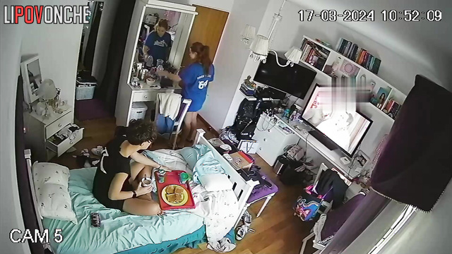 The red-haired girl presses her sexy body tightly against boyfriend's back