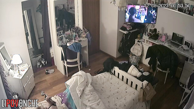 The girl took a break from the TV show for some pleasurable masturbation