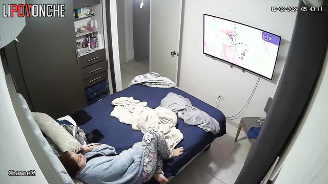 A young lover strokes the sexy mommy's ass under her pajama bottoms