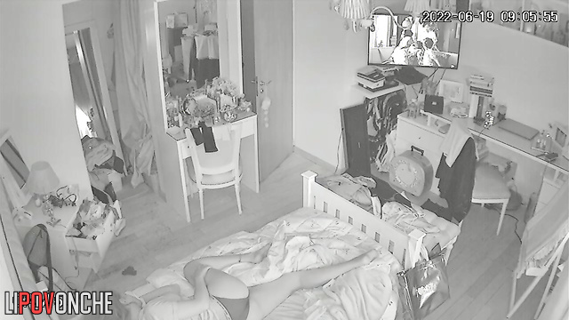 The student, who was relaxing in bed, got bored and ran her hand under her panties