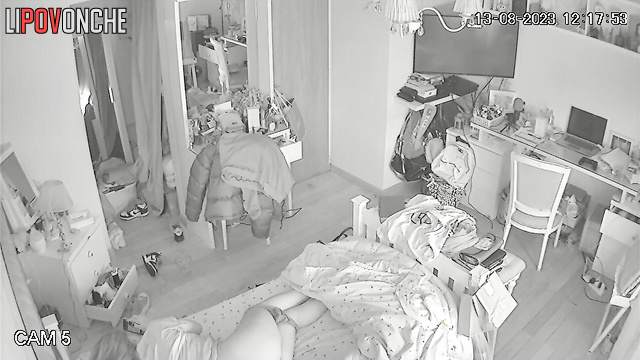 A bored college student pulls down her panties and plays with her labia