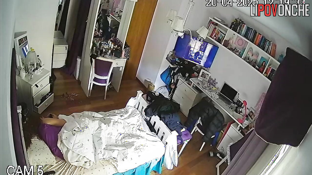 A bored, pretty girl plays with her clitoris while hiding under a blanket