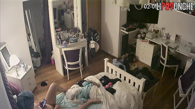 A red-haired beauty with a hairy pussy walks into the room completely naked