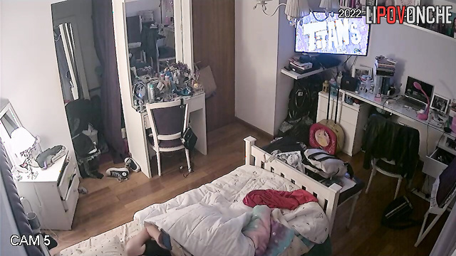 After her orgasm, the redheaded girl pulls her panties up over her bare bottom
