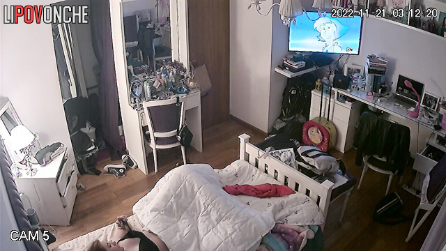 After her orgasm, the redheaded girl pulls her panties up over her bare bottom