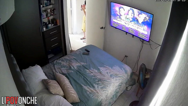 A wet brunette, fresh out of the shower, tries to seduce her lover into having sex