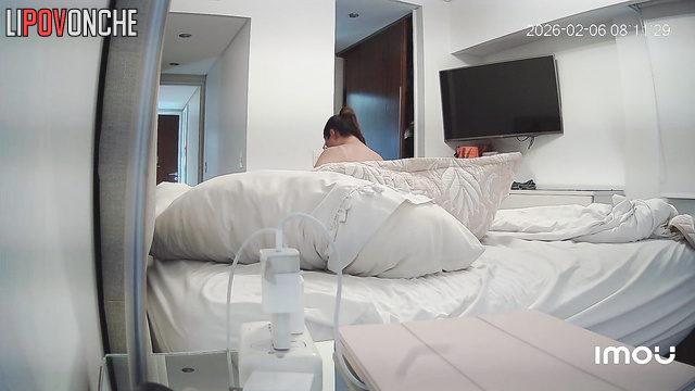 Hidden camera video of a fat milf coming out of the bathroom naked