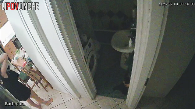 The girl seductively slips out of her sexy black nightgown before taking a shower