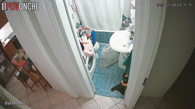 The girl seductively slips out of her sexy black nightgown before taking a shower