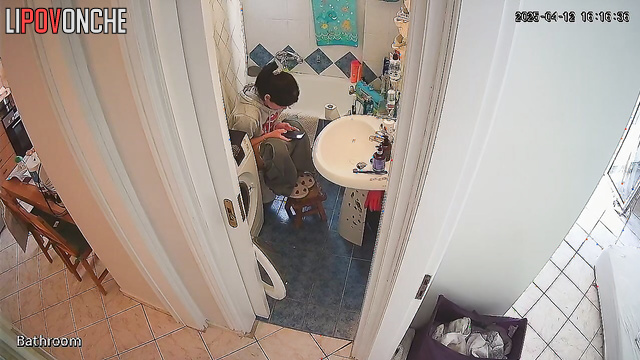 A cute brunette washes her butt, then carefully dries it and her wet pussy