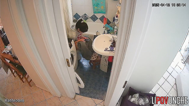 A cute brunette washes her butt, then carefully dries it and her wet pussy