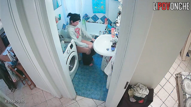 A cute girl pulls down her panties and is completely focused on peeing