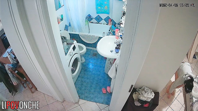A cute girl pulls down her panties and is completely focused on peeing