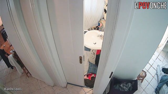 A girl with her naked ass takes off a panty liner from her half-way-down panties
