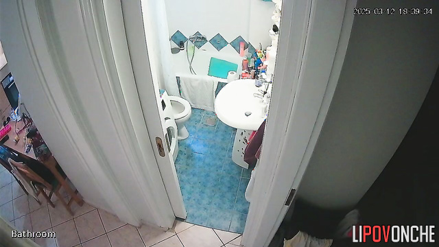 Brunette carefully wipes her wet pussy and examines her panty liner