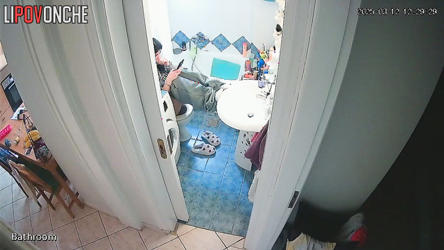 A pretty brunette likes to direct the shower stream at her delicate anus
