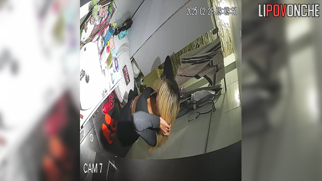 The blonde bares her tattooed butt as she sits down on the toilet