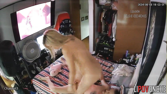 Blonde enjoying tv watching and ass licking at the same time