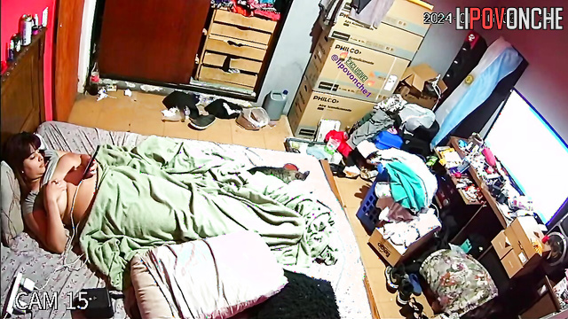 Busty brunette is bored on the bed (hidden camera)