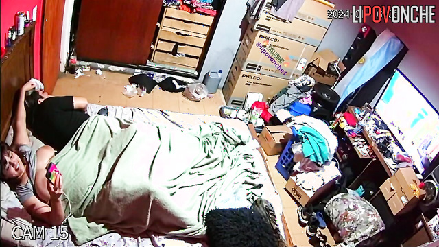 Busty brunette is bored on the bed (hidden camera)