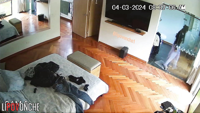 A hidden camera installed in the bedroom captured an attractive naked girl