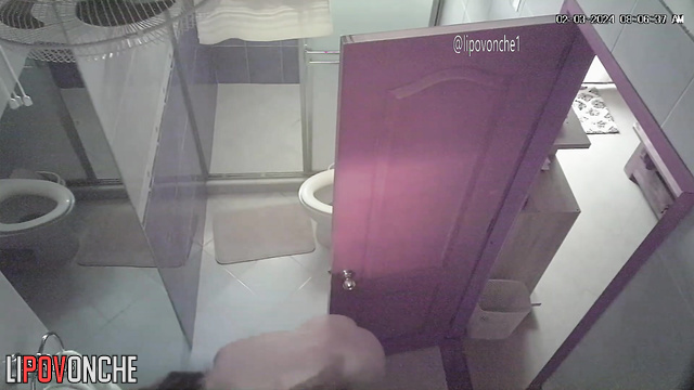 A slender blonde seductively undresses before taking a shower