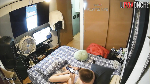 A young gay man livestreams himself playing with his erect cock