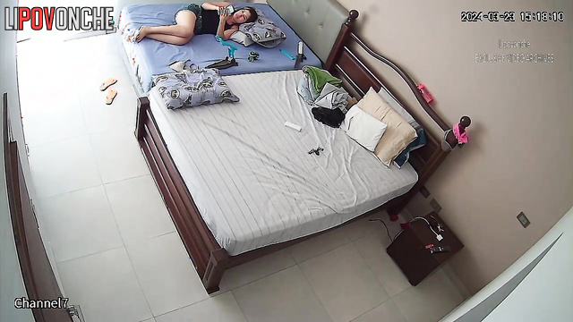 The husband pulls his wife's shorts down and thrusts his cock into her hairy pussy