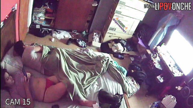 A curvy brunette in sexy red panties prefers to sleep with the TV on